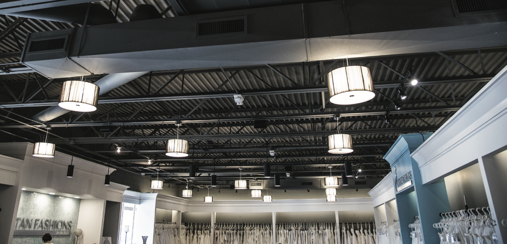 Bridal boutique with LED chandelier fixtures